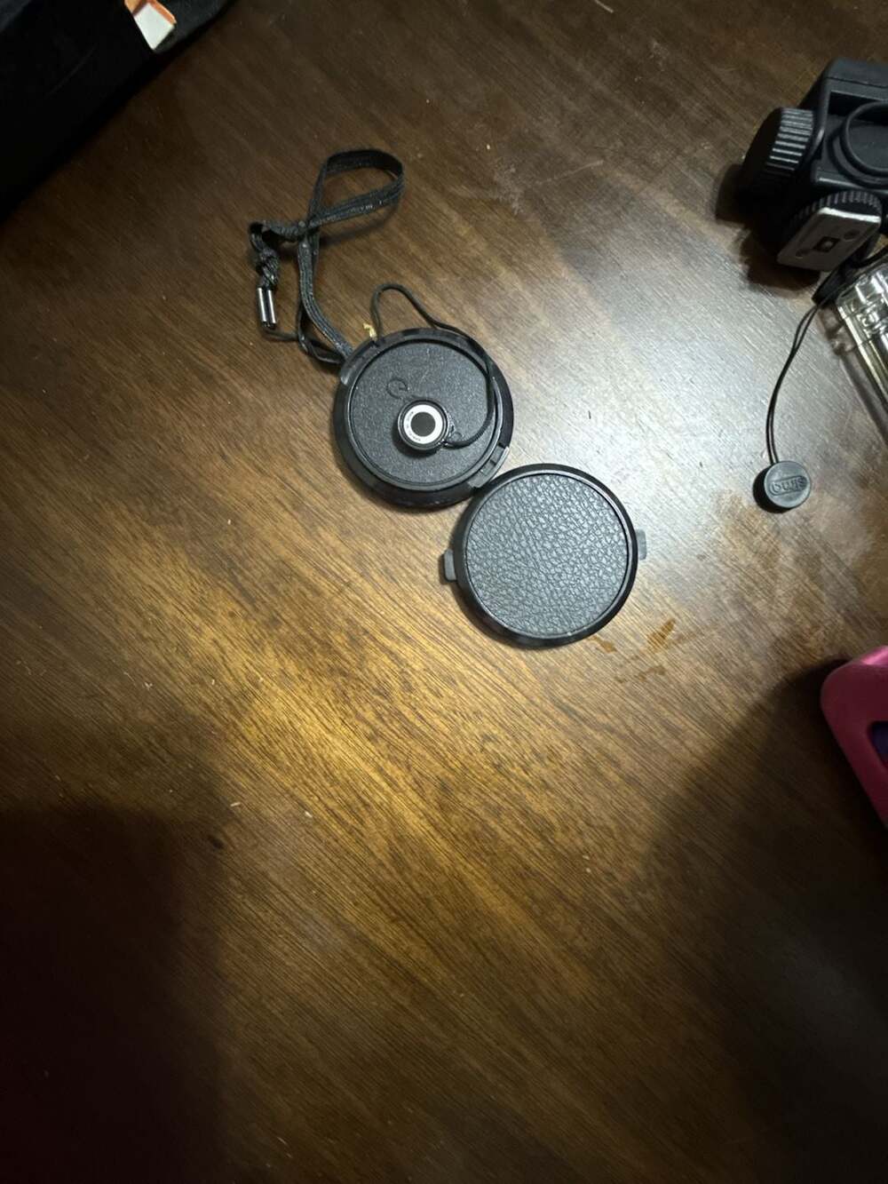 Unbranded Black Pinch Snap On Lens Cap with Sima Lanyard and Textured Front